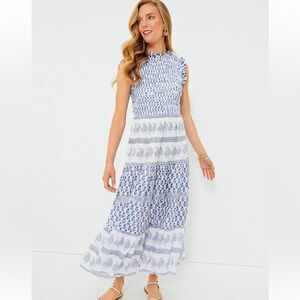 A warm-weather staple, and a best-selling style, the Exclusive Flora Blue Dress.